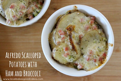 Alfredo Scalloped Potatoes with Ham and Broccoli in white bowls.