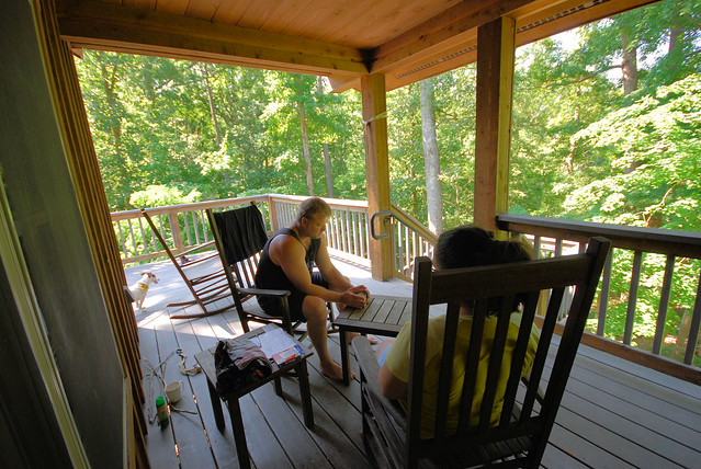 Playing cards on the porch of our cabin 4 at Occoneechee State Park