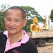 Committee member supervising Buddha transport in temple Wat Luang 16 04 2013.