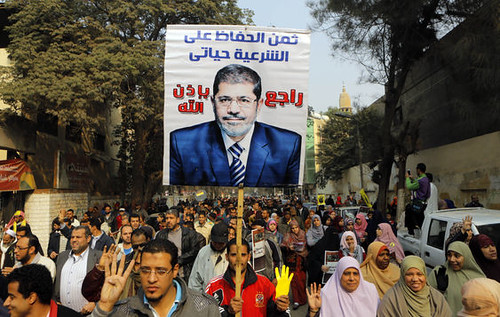 Egyptian clashes between anti-coup protesters and military supporters took place on December 20, 2013. Demonstrations against the draft constitution are escalating. by Pan-African News Wire File Photos