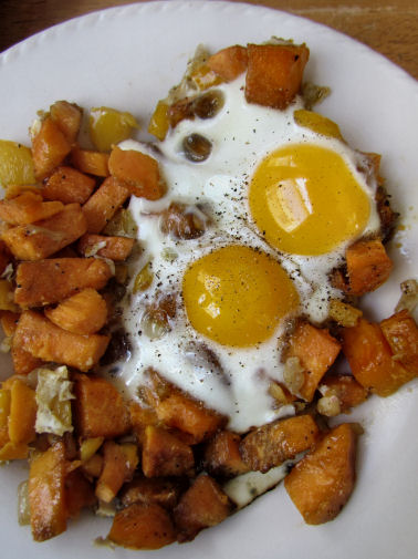 Eggs over sweet potato hash