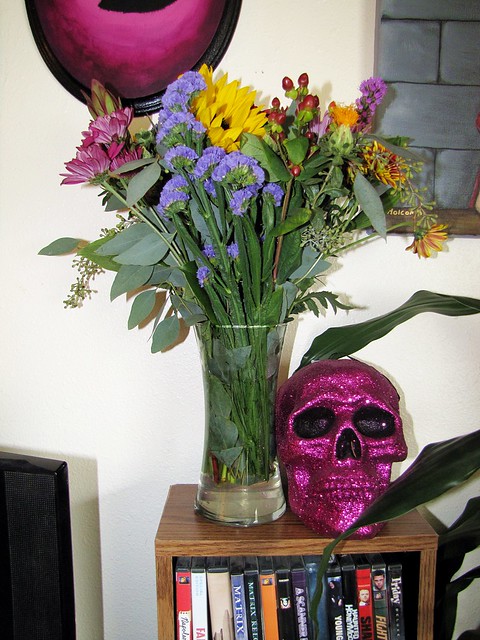 glitter skull and flower arrangement