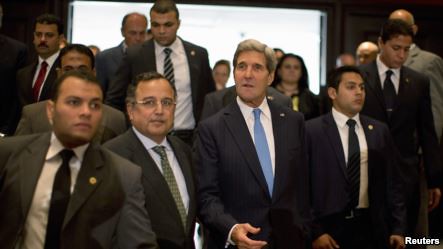 U.S. Secretary of State John Kerry with Egyptian Foreign Minister Nabil Fahmi in Cairo. Kerry reiterated support from Washington to the new military-backed regime. by Pan-African News Wire File Photos
