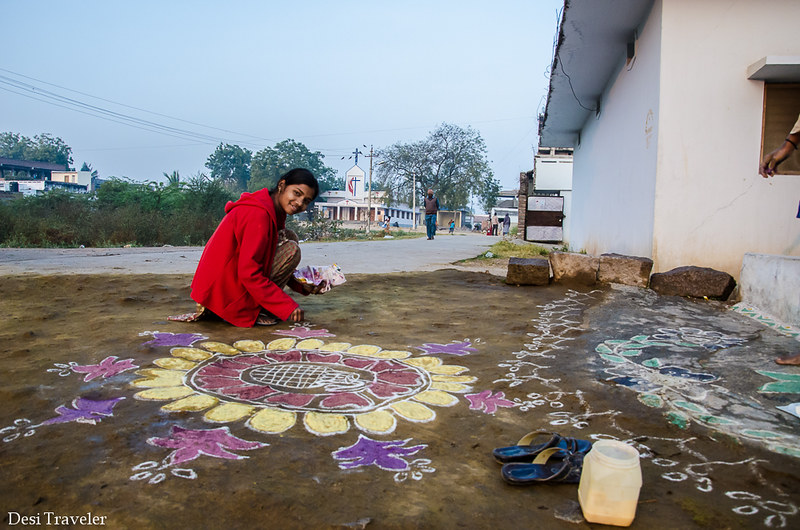 girl making rangoli in Telangana Village India