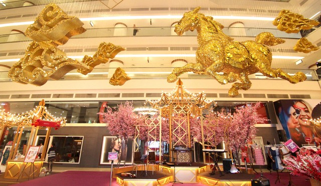 A regal figure of a golden horse erected on the Ground Floor Atrium, Avenue K to usher in the Year of the Horse