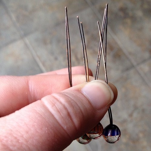 Double ended headpins on bronze wire. #glassaddictions #lampwork