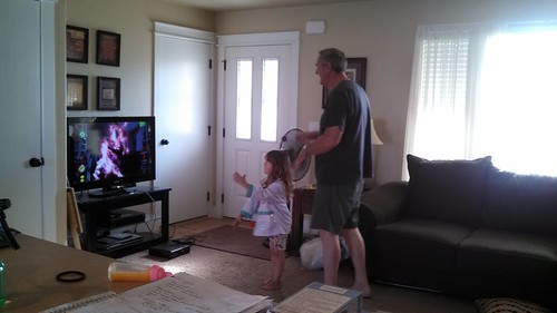 Lily and her grandpa playing Kinect party