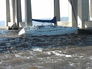 The Coast Guard is responding after receiving reports that a 38-foot sailboat struck the Buckman Bridge in Jacksonville, Fla., Thursday, Nov. 14, 2013. The sailboat, named Interceptor, broke free from its mooring at Mulberry Cove Marina in Jacksonville before the vessel struck a bridge fender and the mast struck the concrete beneath the roadway. (Photo courtesy of Mike Senft)