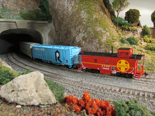 A 1970's era Santa Fe freight train enters the tunnel. by Eddie from Chicago