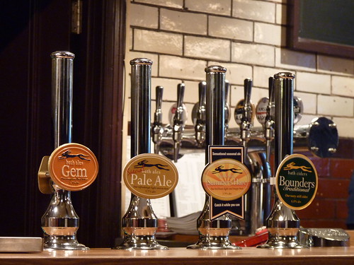Hand pumps displaying Bath Ales pump clips on the bar at The Grapes