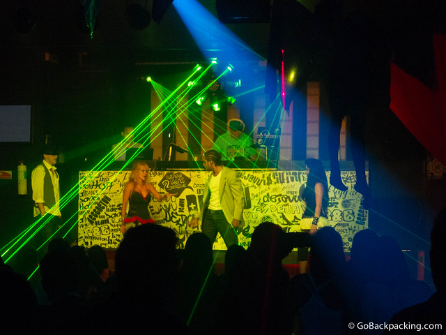 Dancers performing in front of the DJ booth