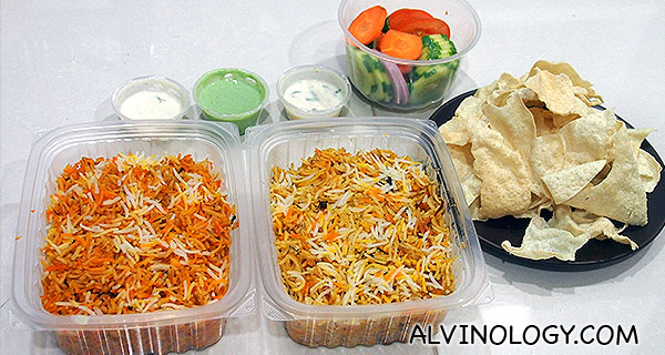 A salad, mutton briyani and chicken briyani to share between two pax