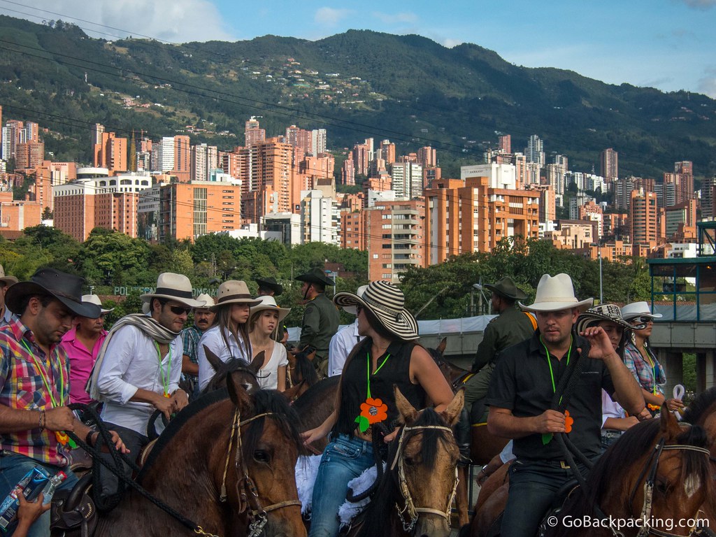 The high rises and mountains of Poblado form a colorful backdrop to the parade