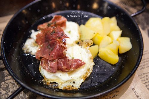 "Traditional" Breakfast - fried eggs topped with jamon and potatoes