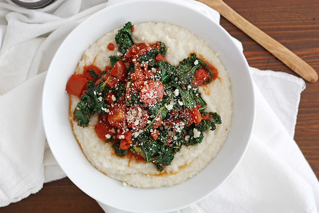 garlicky kale with fire-roasted tomatoes + cheesy brown rice farina "grits"