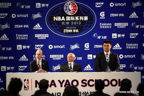 October 15, 2013 - Yao Ming at a press conference in Beijing with NBA commissioner David Stern to announce the NBA Yao School