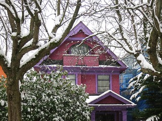 Purple house in snow