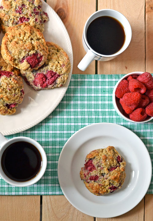 Raspberry scones served with fresh raspberries and coffee