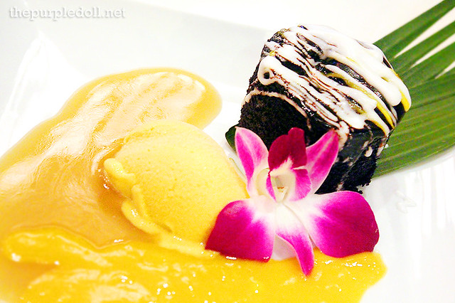 Chocolate Pudding with Mango Ice Cream, Mango Sauce and Kaffir Butterscotch Sauce (P240)