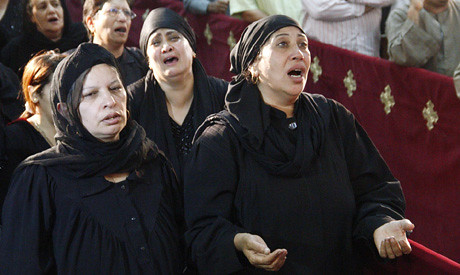 Familes of victims mourn the deaths of four people at a wedding held in the Egypt Church of the Virgin in the Geziret Al-Warraq. Sectarian violence has escalated in Egypt. by Pan-African News Wire File Photos