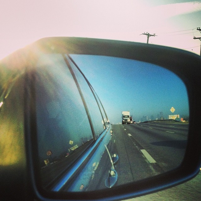 That skyline in the mirror is Dallas. #goodbyeTexas #imgoingtodisneyworld