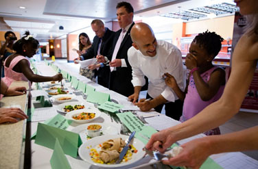 Judges, including Sam Kass, Executive Director of Let's Move! (second from right), and Robert Post, Associate Executive Director, USDA Center for Nutrition Policy and Promotion (fourth from right), score lunch recipes submitted by kids from around the country. Winning recipes were served at the White House for the Kids' State Dinner on July 9, 2013. (Official White House Photo by Chuck Kennedy)