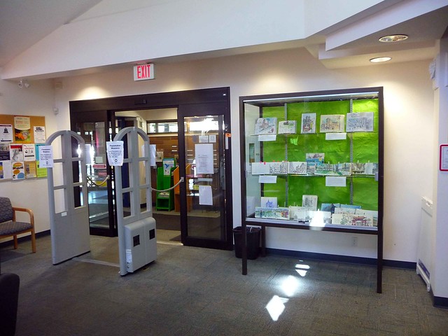 Entrance to the Oak Bay Library with urban sketchbooks display