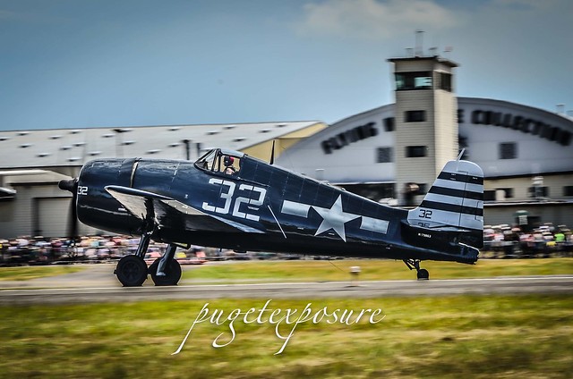 Grumman F6F-5N Hellcat with Kevin Eldredge at the controls accelerates down the runway