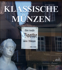 Window sign telling that Goethe purchased his coins here