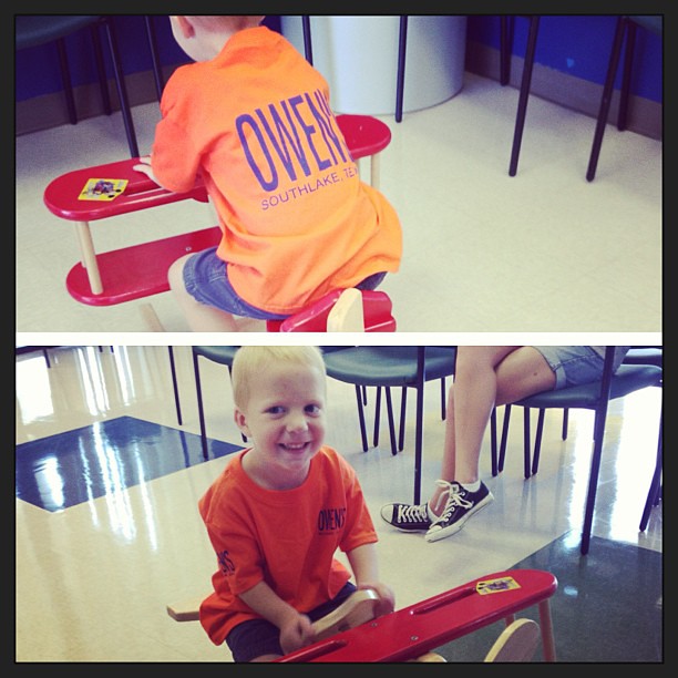 Owen (feeling all better) gets to accompany his sisters to their well visits (they're less than thrilled to be here). He found a plane to ride, toy story is playing in the waiting room, & his orange "Owen" shirt is finally dry (we painted it yesterday).