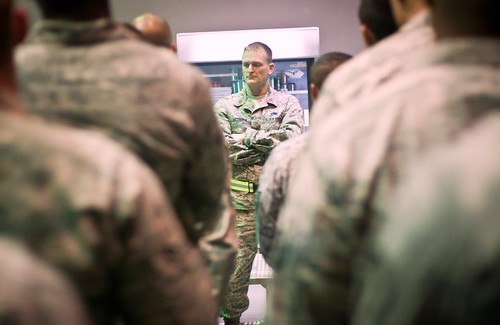 Maj. Matthew McCoppin conducts a briefing during a recent deployment to Al Udeid Air Base, Qatar. Photo courtesy: Matt Branson. Photos used with permission.