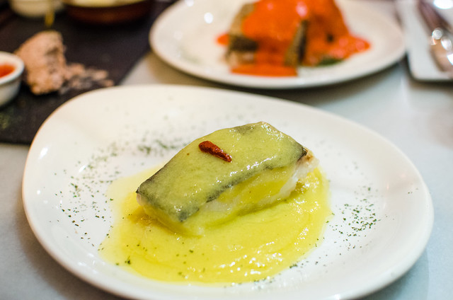 Cod smothered in garlic sauce at Sevilla's Vinería San Telmo.