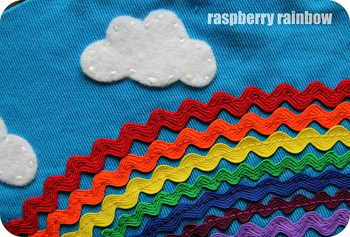 Rainbow, with a chance of fluffy felt clouds.