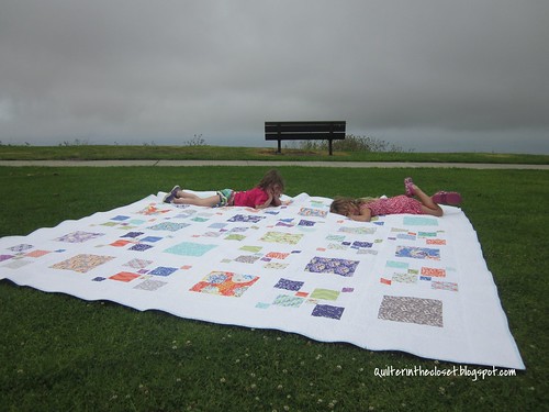 Tired helpers after laying out Gigantor quilt