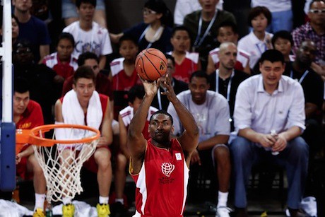 July 1st, 2013 - Metta World Peace puts up a shot with Yao Ming and Tracy McGrady looking on