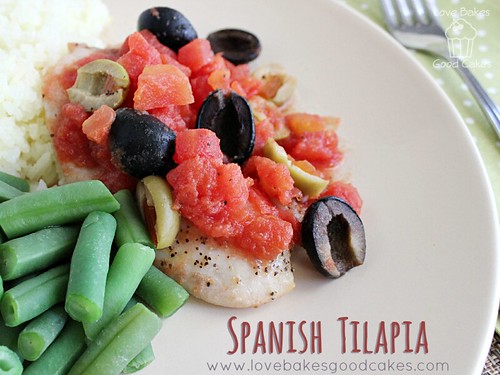 Spanish Tilapia with rice and green beans close up.