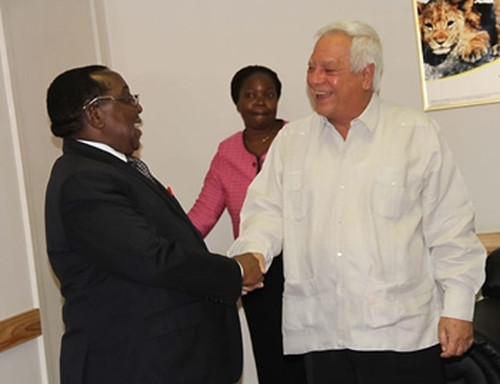 Cuban ambassador to Zimbabwe Enrique Antonio Prieto Lopez bids farewell to official Simon Khaya Moyo on November 5, 2013. by Pan-African News Wire File Photos