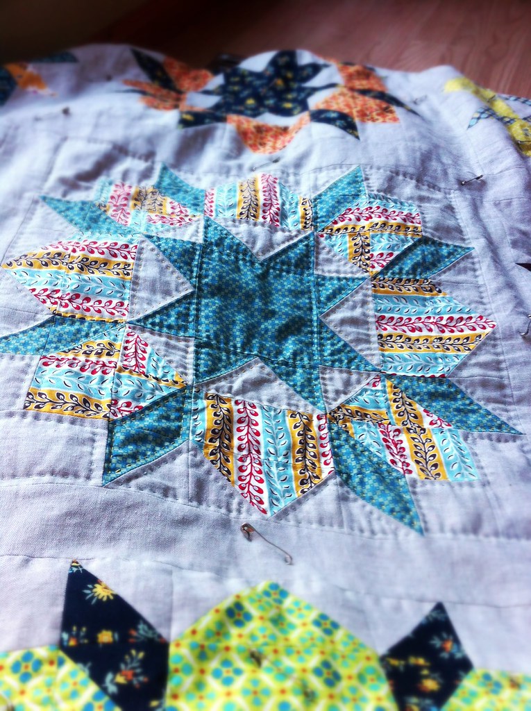 Hand quilting, 1st block done.  The Swoon Quilt.