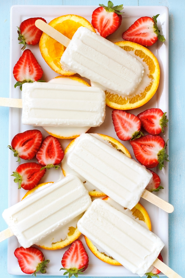 Coconut Popsicles - Made with just 4 INGREDIENTS, these are the best coconut creamsicles ever! #coconutpopsicles #coconutcreampopsicles #paletasdecoco | Littlespicejar.com