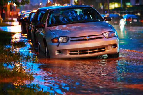 Rising waters often left vehicles stranded or simply inoperable. Photo by Jon Pernul.
