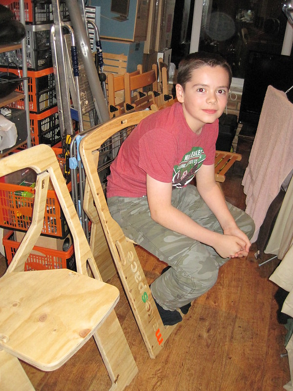 Alex sat on version 3 folding chair