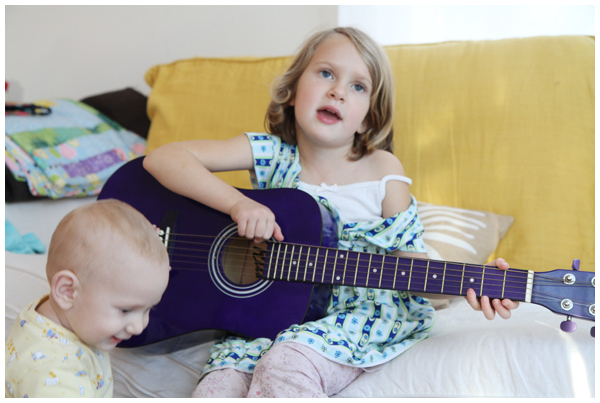 She loves playing that purple guitar