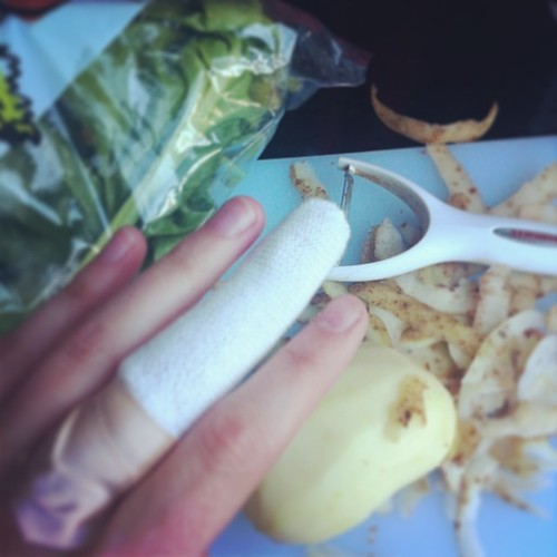 Gaily peeling potato, thinking "good thing I have a cheap peeler and there's no danger of peeling half my fingernail off." Promptly peeled half my fingernail off.