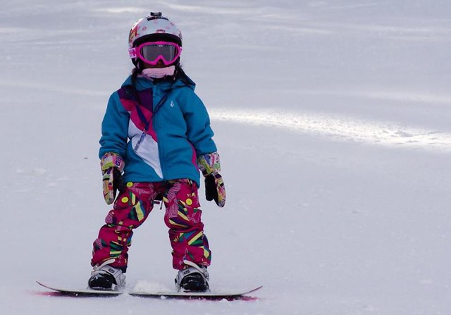 Kid snowboarding at Loveland