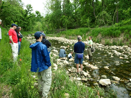 Image of DEP staff leading a restoration education event at Booze Creek.