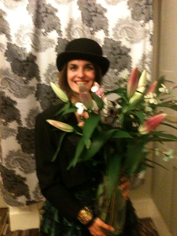 Woman with flowers in a bowler hat