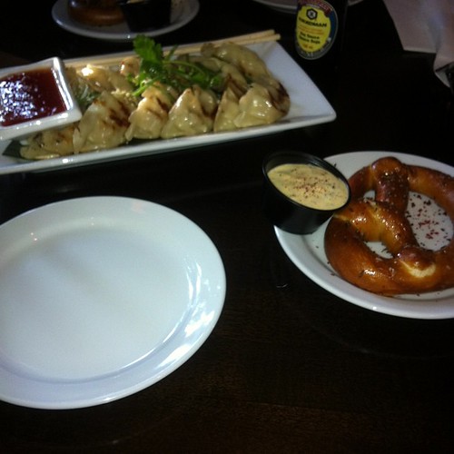 Gyoza and Bavarian pretzel at Brewsters. #yegfood by raise my voice