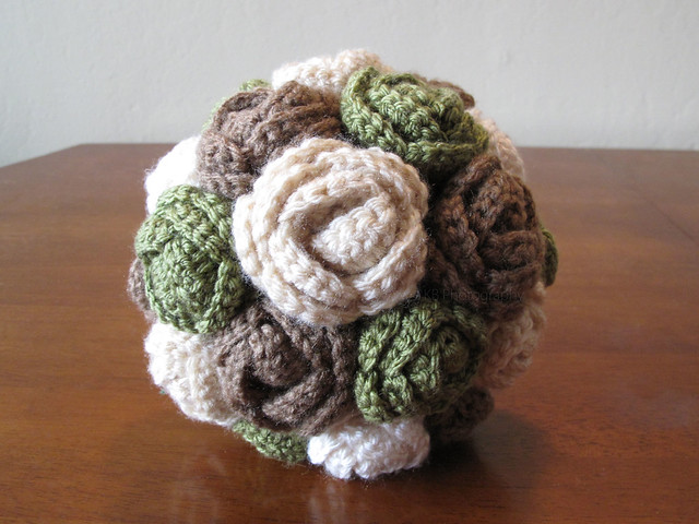 Crocheted rose bouquet in green, brown, cream, and sand colors