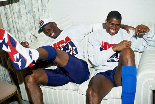 1992: Michael Jordan and Magic Johnson of the United States Basketball Team share a laugh during the 1992 Olympics in Barcelona, Spain.