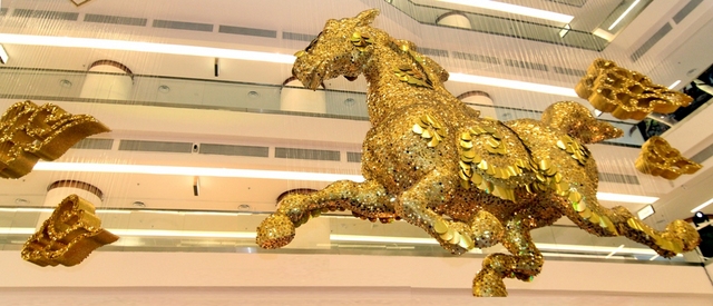 The majestic golden horse at Avenue K's ground floor atrium to usher in the new Year